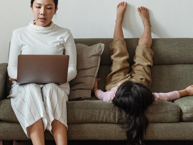 Parent and child on couch