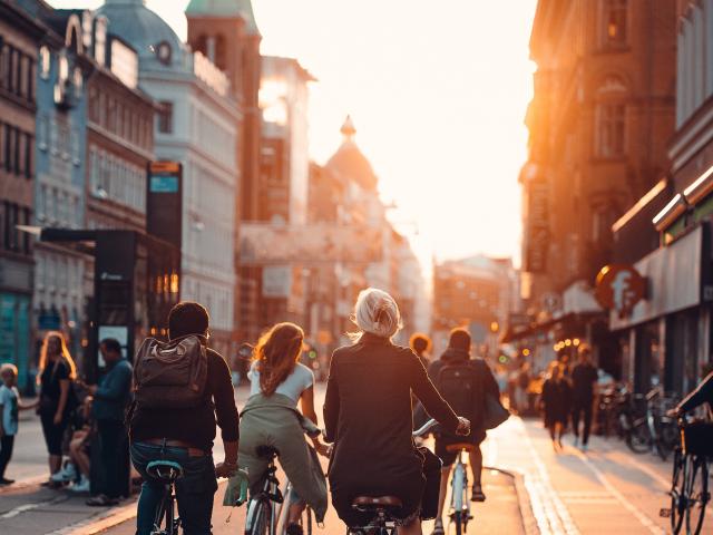 copenhagen group of cyclists at sunset