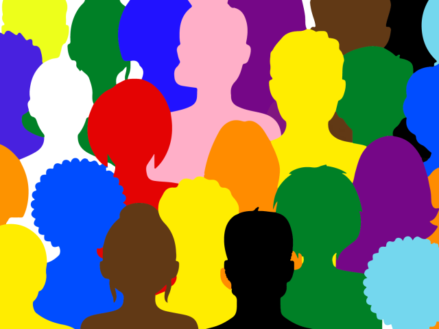 Illlustrated heads in the colors of the Pride flag
