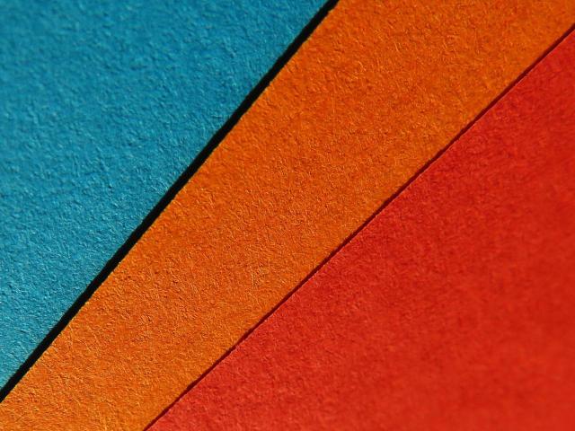 Colored cement blocks stacked on top of one another