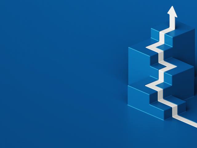Blue blocks on a blue background with a white arrow going up