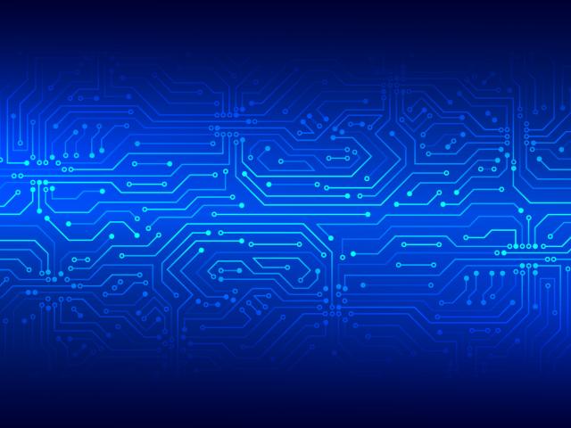 Circuitry etched onto a blue background