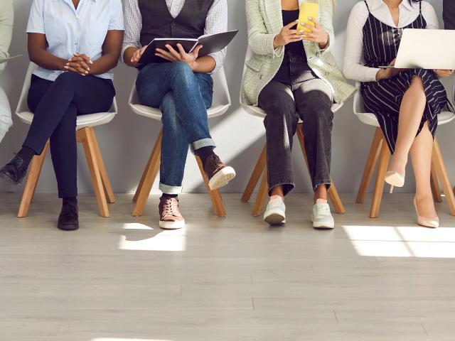 Legs of people sitting down
