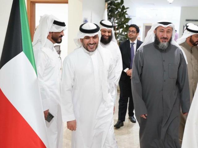A group of men walking and smiling in Riyadh