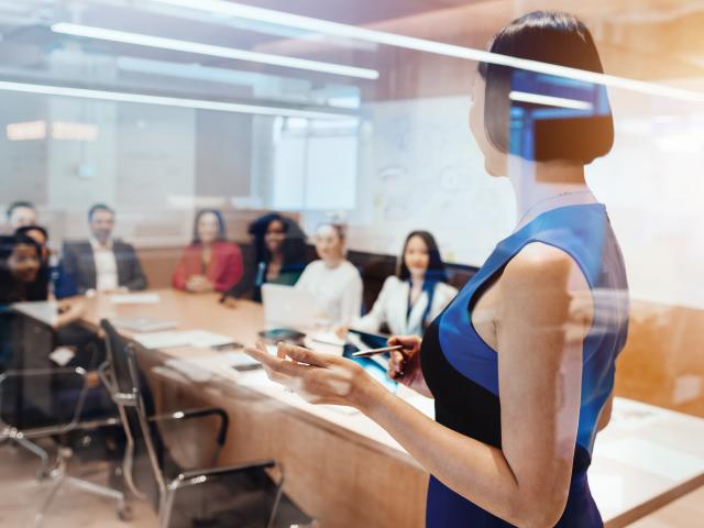 Woman leading a business meeting