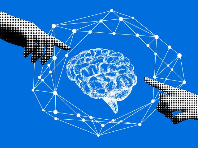 Two human hands touching an illustration of a brain 