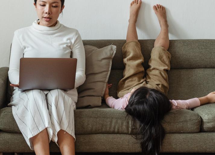 Parent and child on couch