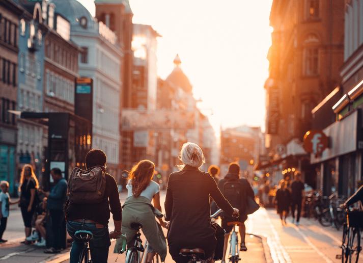 copenhagen group of cyclists at sunset