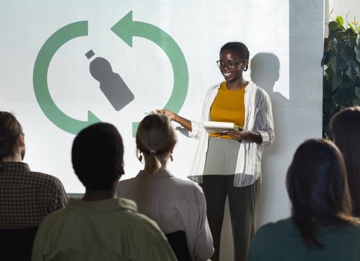 Woman presenting on green topic