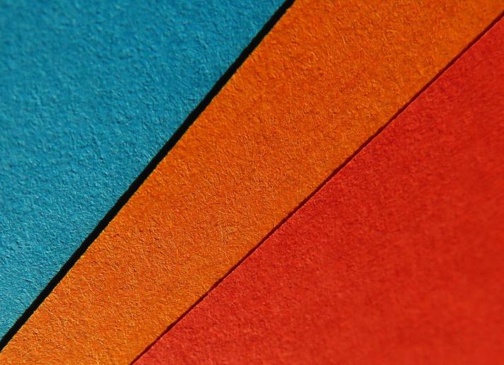 Colored cement blocks stacked on top of one another