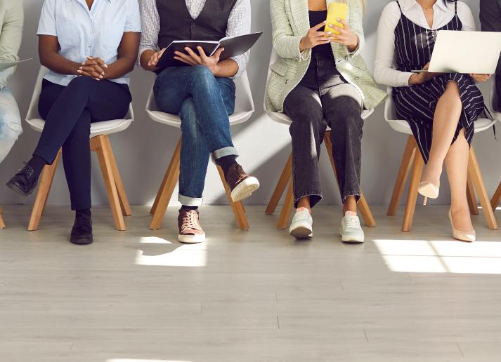 Legs of people sitting down