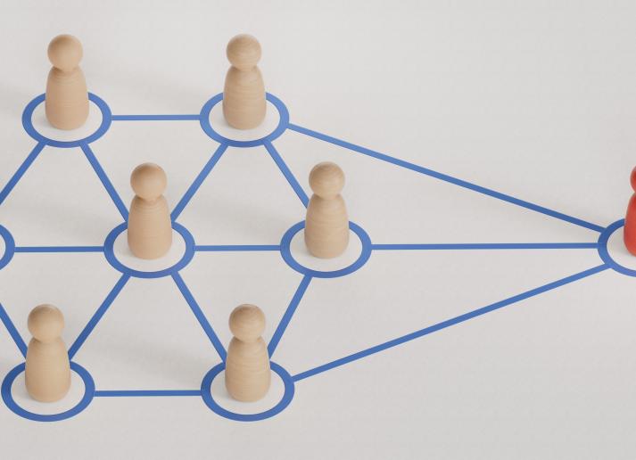 A group of figures all connected to one figure