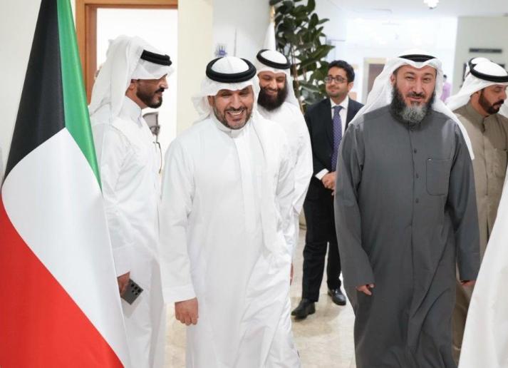 A group of men walking and smiling in Riyadh