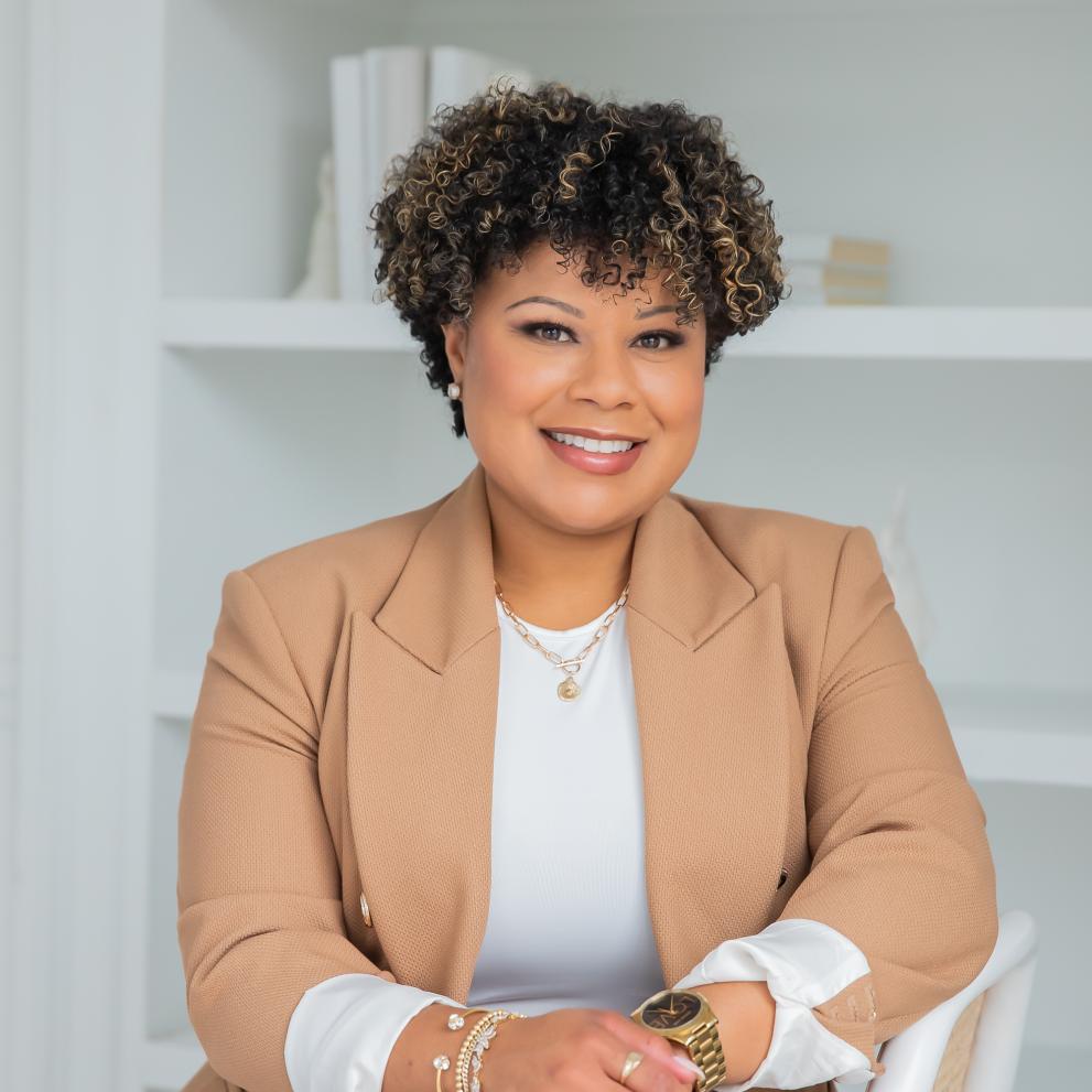 Vanessa Bowen, sitting on chair