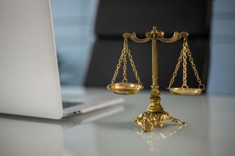 Scale on desk with computer