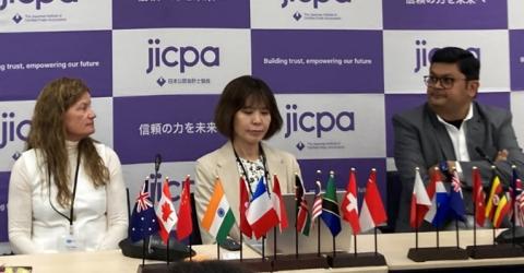 Three people sitting at a panel discussion of the PAIB meeting in Tokyo 2025