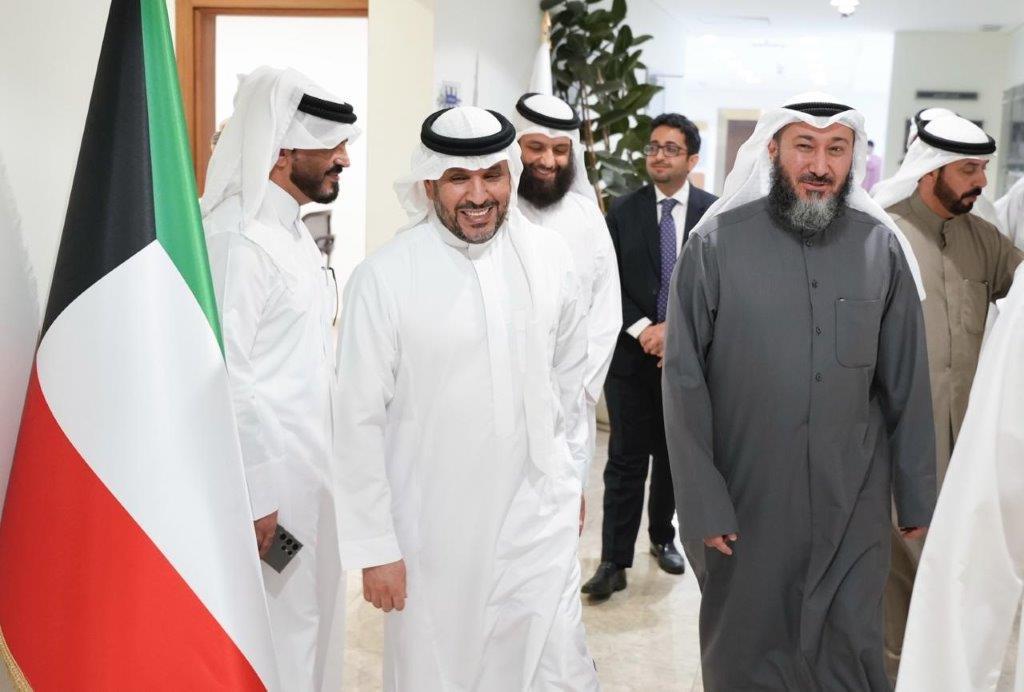 A group of men walking and smiling in Riyadh